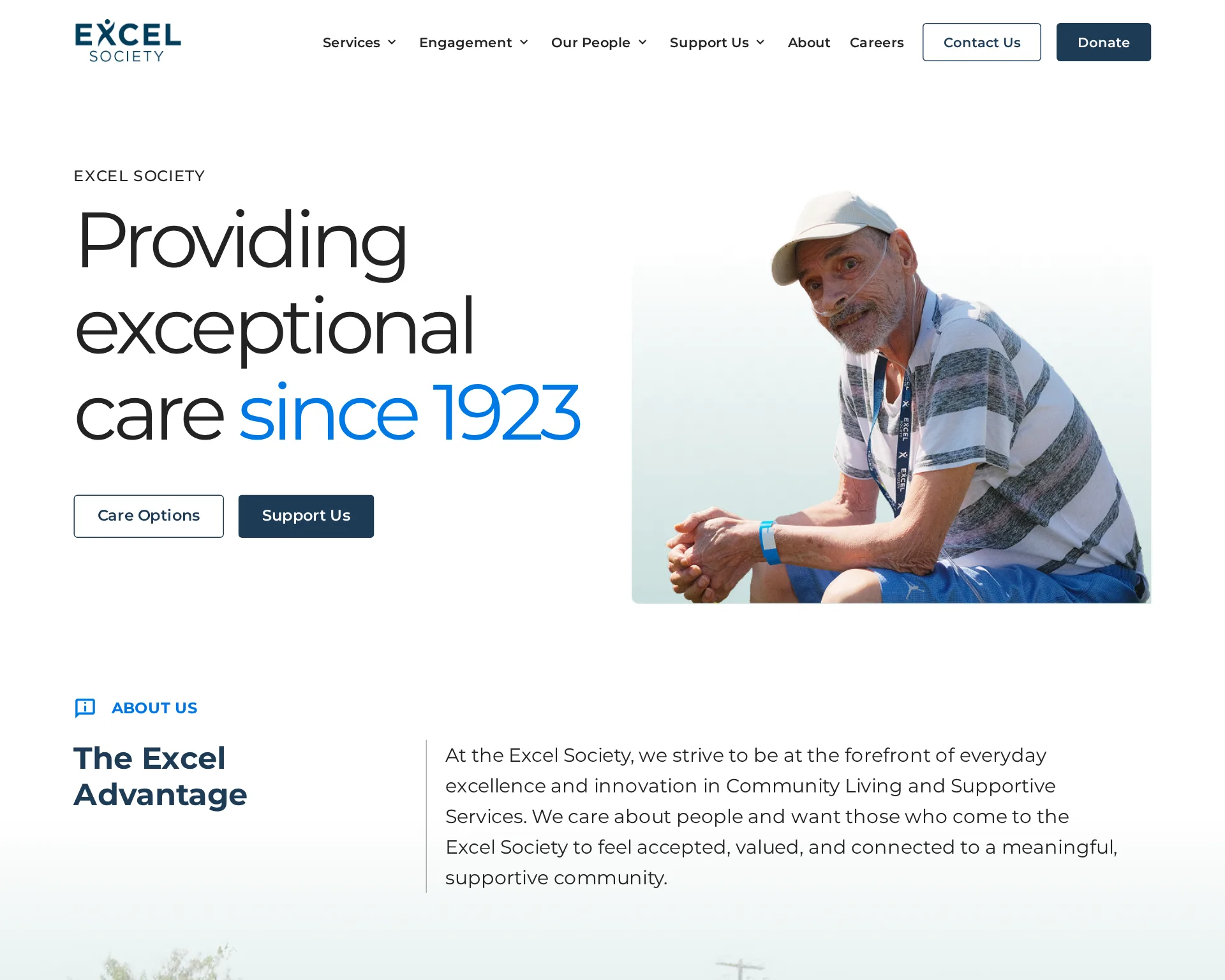 The Excel Society site I built: the shipped responsive nonprofit homepage, in its navy brand.